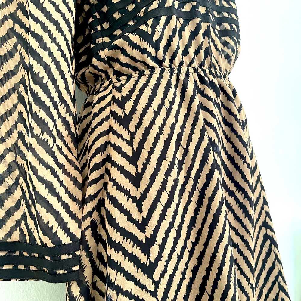 Kova&t dress. Size2. Black and gold. Long sleeve. Great condition. Attached slip